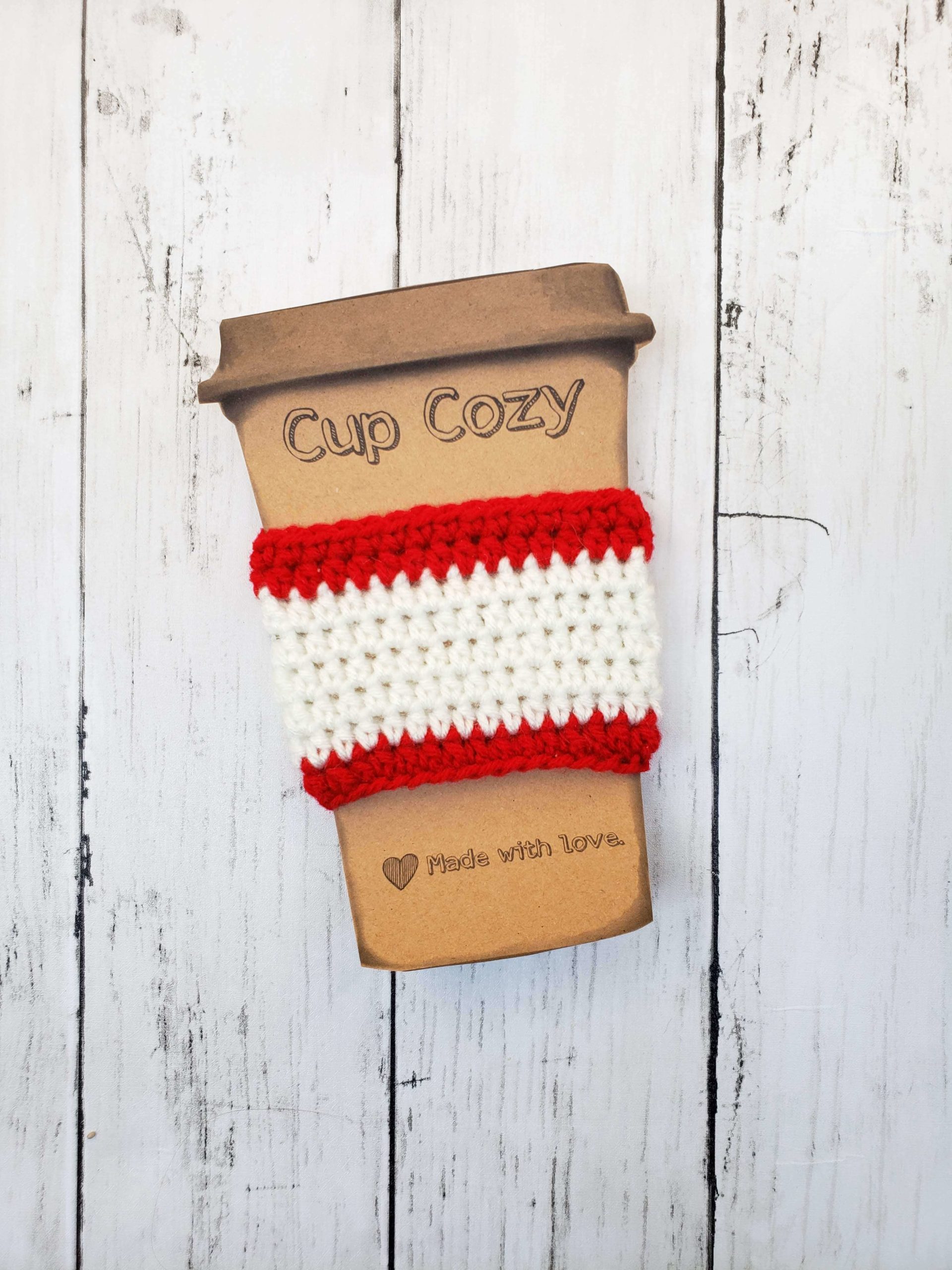 red and white coffee cup cozy