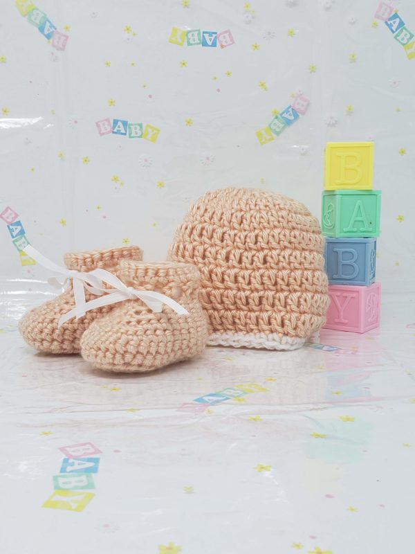 Peach newborn booties and hat set