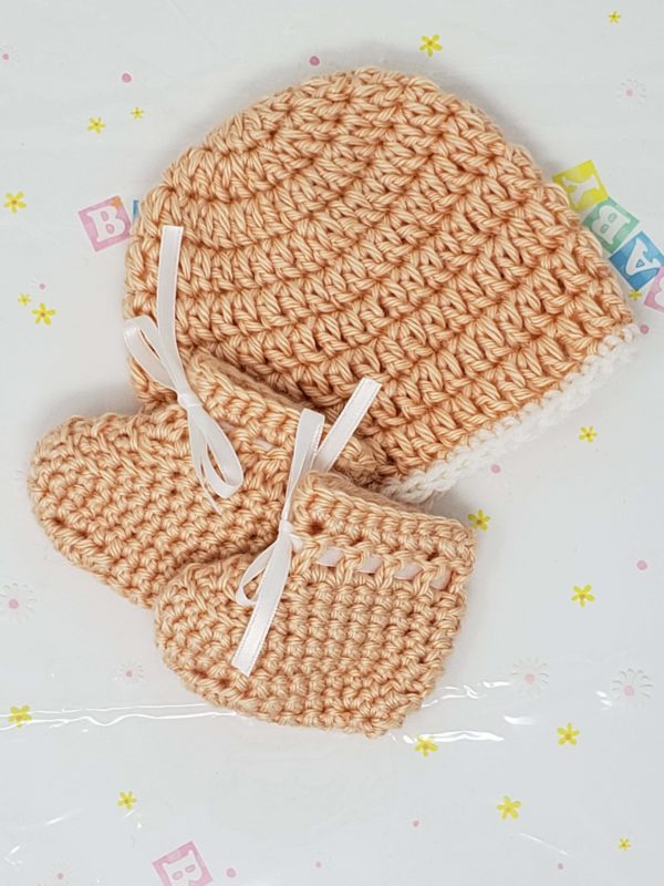 Peach newborn booties and hat set