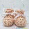 Peach newborn booties