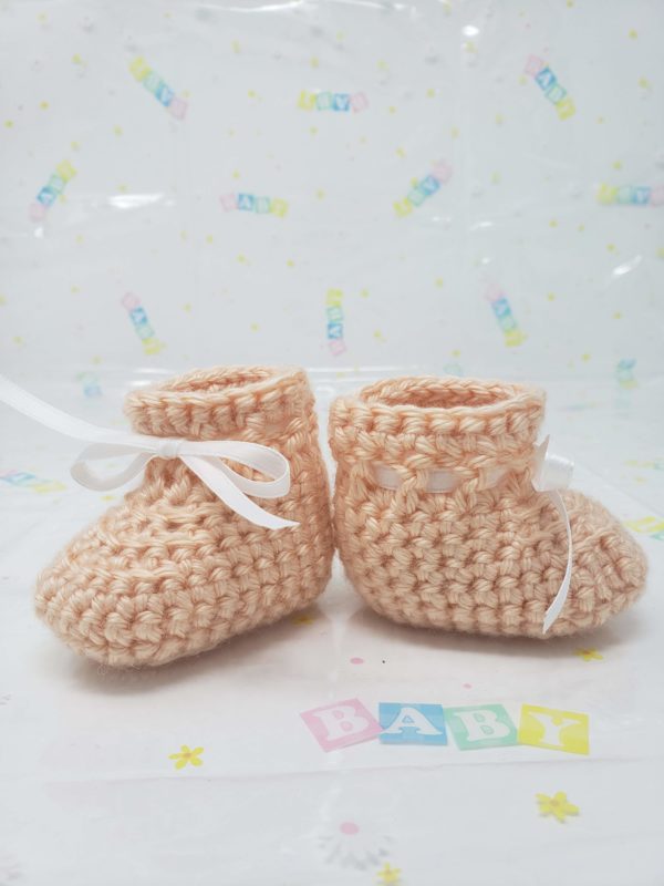 Peach newborn booties