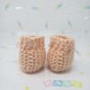 Peach newborn booties