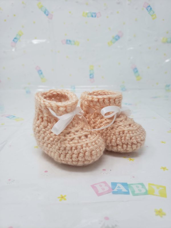 Peach newborn booties