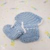 Blue newborn booties and hat set
