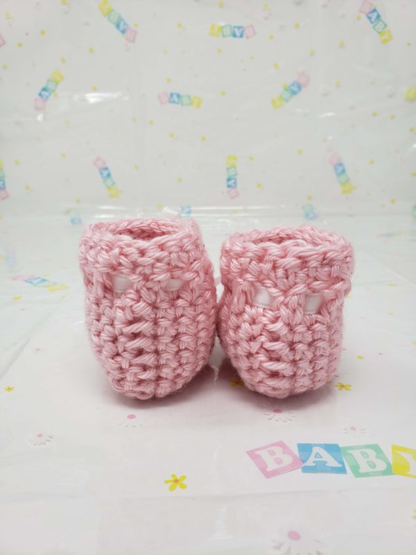 Pink newborn booties