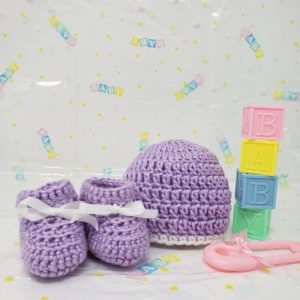 Purple newborn booties and hat set