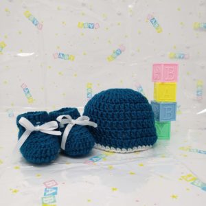 Teal newborn booties and hat set