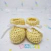 Yellow newborn booties