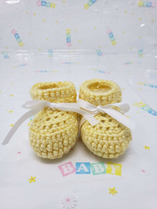 Yellow newborn booties