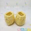 Yellow newborn booties