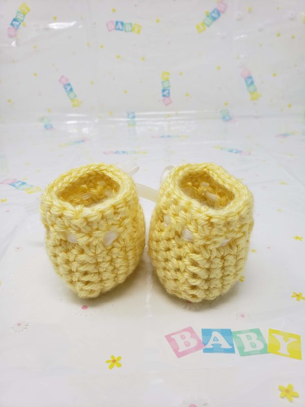Yellow newborn booties