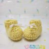 Yellow newborn booties