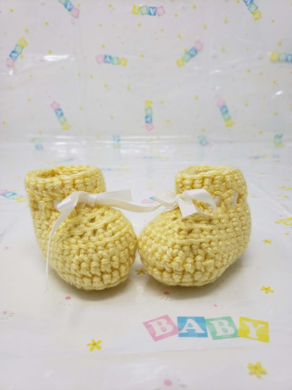 Yellow newborn booties