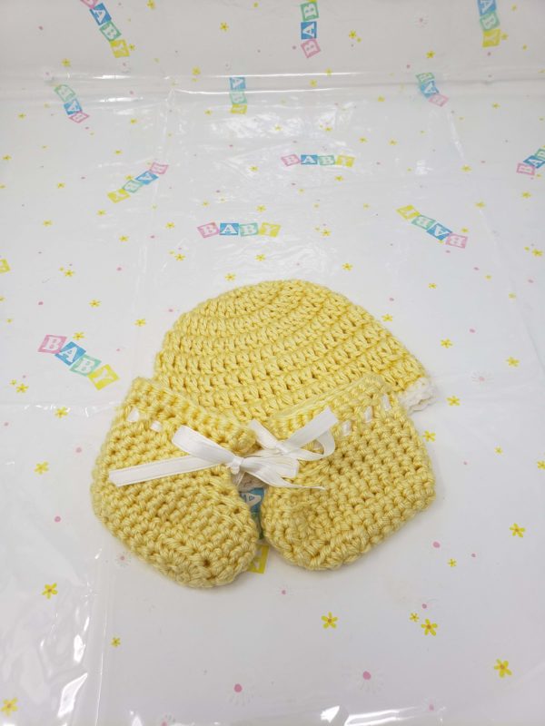 Yellow newborn booties and hat set